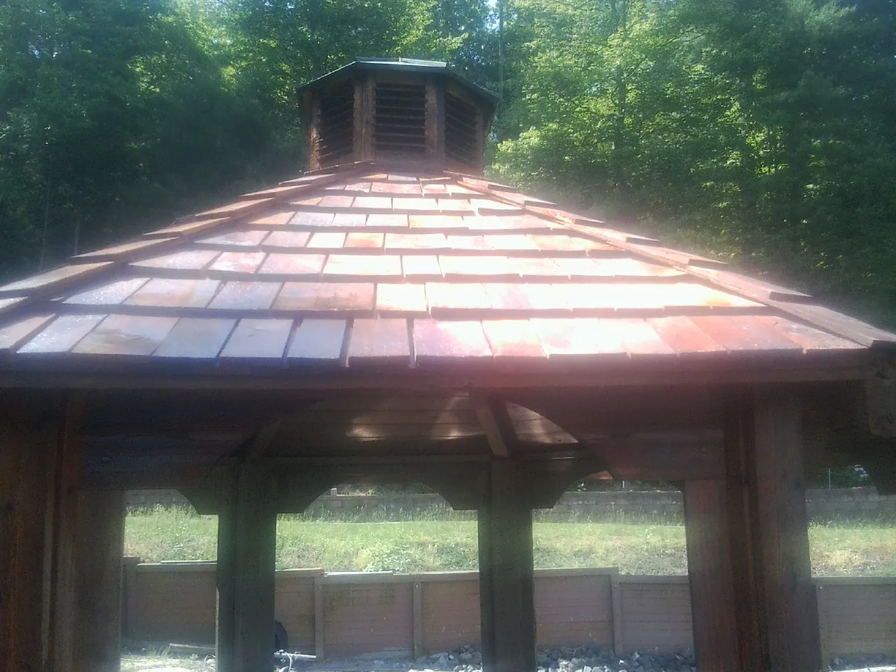 New cedar shake roof and cupola on a lakeside gazebo in Cleveland
